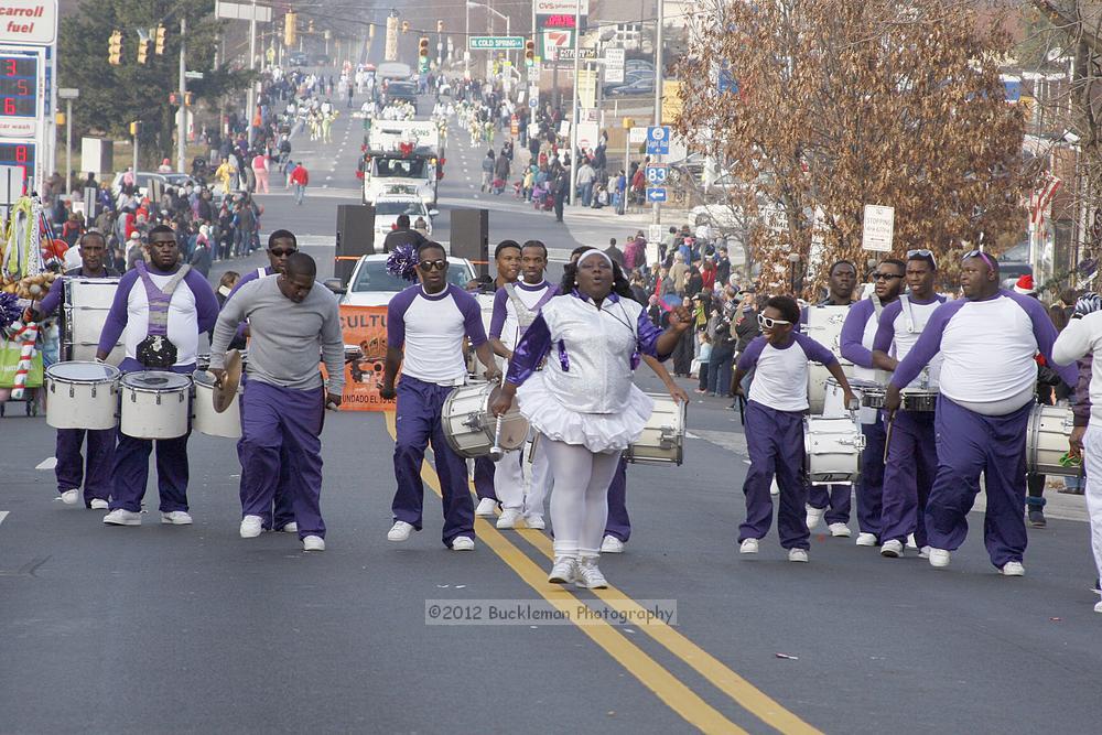 40th Annual Mayors Christmas Parade 2012\nPhotography by: Buckleman Photography\nall images ©2012 Buckleman Photography\nThe images displayed here are of low resolution;\nReprints available,  please contact us: \ngerard@bucklemanphotography.com\n410.608.7990\nbucklemanphotography.com\nFile Number 2641.jpg