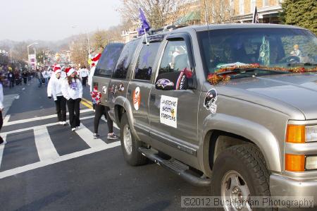 40th Annual Mayors Christmas Parade 2012\nPhotography by: Buckleman Photography\nall images ©2012 Buckleman Photography\nThe images displayed here are of low resolution;\nReprints available,  please contact us: \ngerard@bucklemanphotography.com\n410.608.7990\nbucklemanphotography.com\nFile Number 5791.jpg