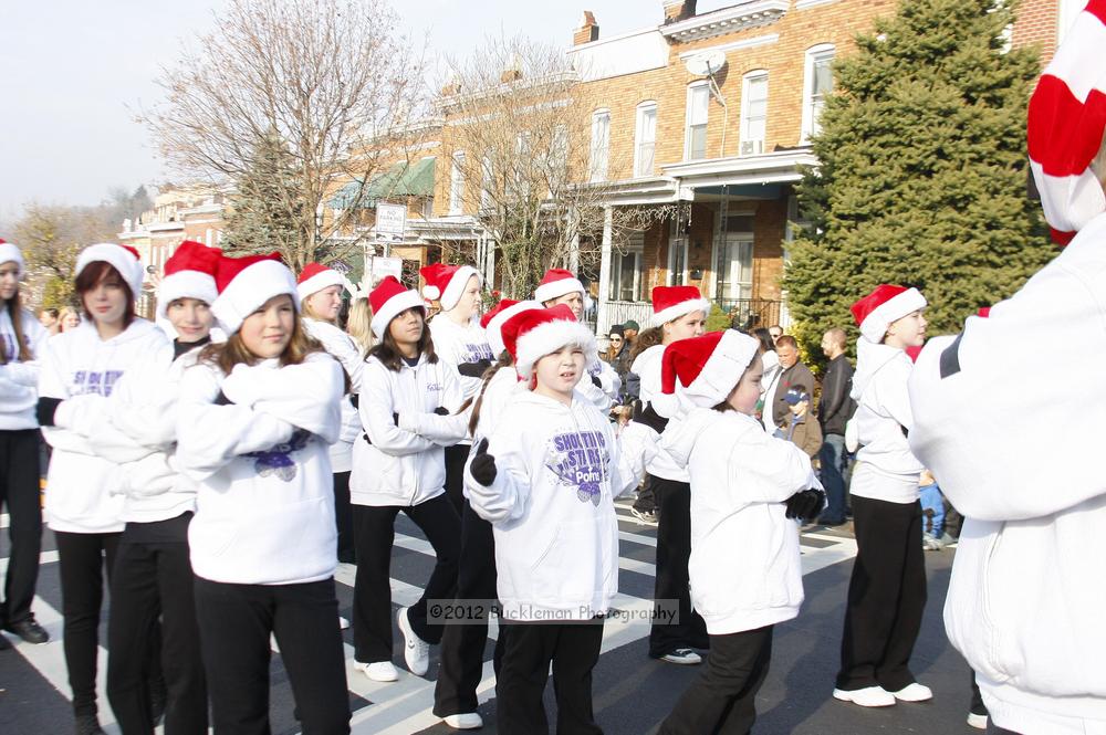 40th Annual Mayors Christmas Parade 2012\nPhotography by: Buckleman Photography\nall images ©2012 Buckleman Photography\nThe images displayed here are of low resolution;\nReprints available,  please contact us: \ngerard@bucklemanphotography.com\n410.608.7990\nbucklemanphotography.com\nFile Number 5792.jpg