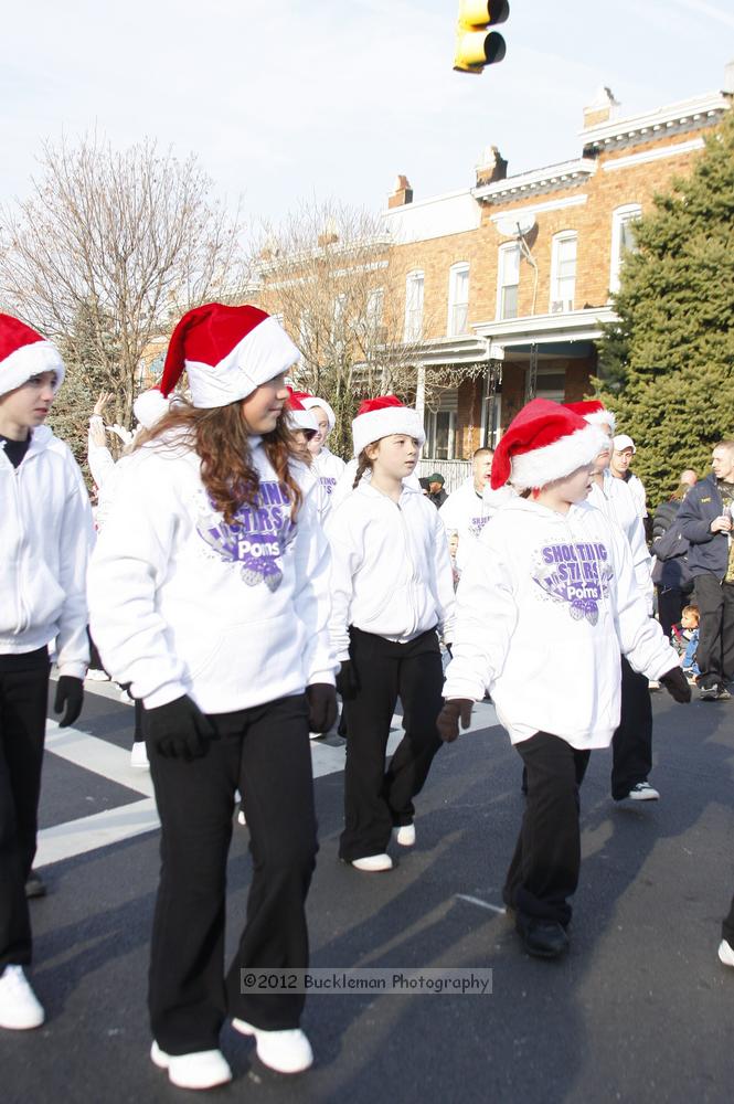 40th Annual Mayors Christmas Parade 2012\nPhotography by: Buckleman Photography\nall images ©2012 Buckleman Photography\nThe images displayed here are of low resolution;\nReprints available,  please contact us: \ngerard@bucklemanphotography.com\n410.608.7990\nbucklemanphotography.com\nFile Number 5793.jpg