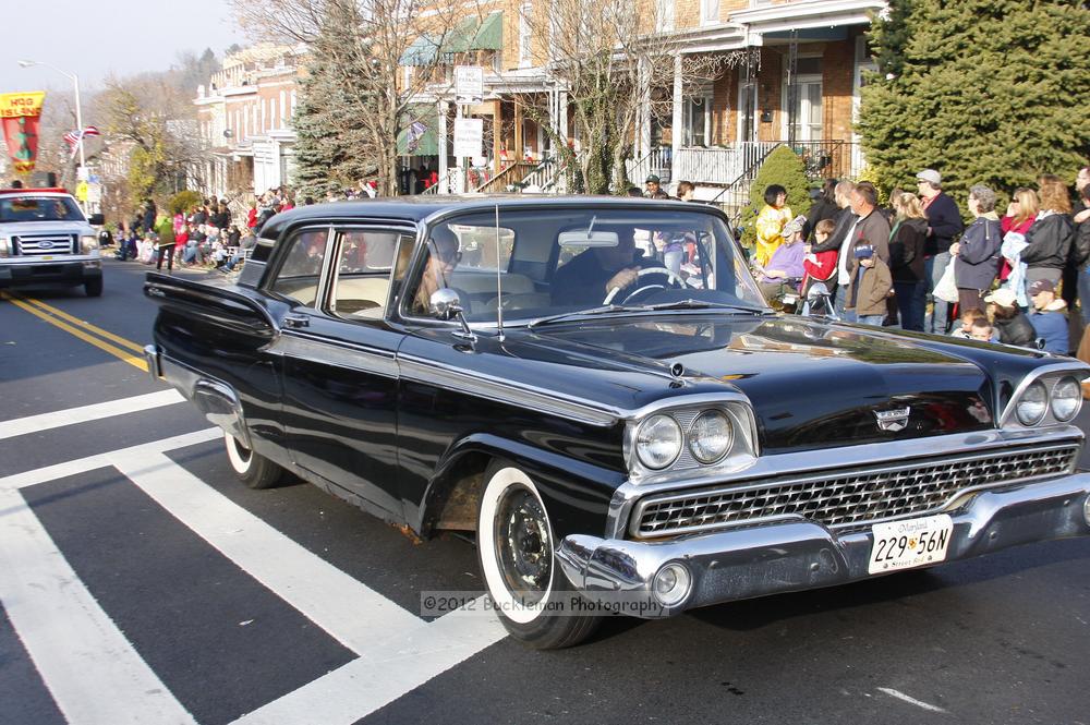 40th Annual Mayors Christmas Parade 2012\nPhotography by: Buckleman Photography\nall images ©2012 Buckleman Photography\nThe images displayed here are of low resolution;\nReprints available,  please contact us: \ngerard@bucklemanphotography.com\n410.608.7990\nbucklemanphotography.com\nFile Number 5834.jpg