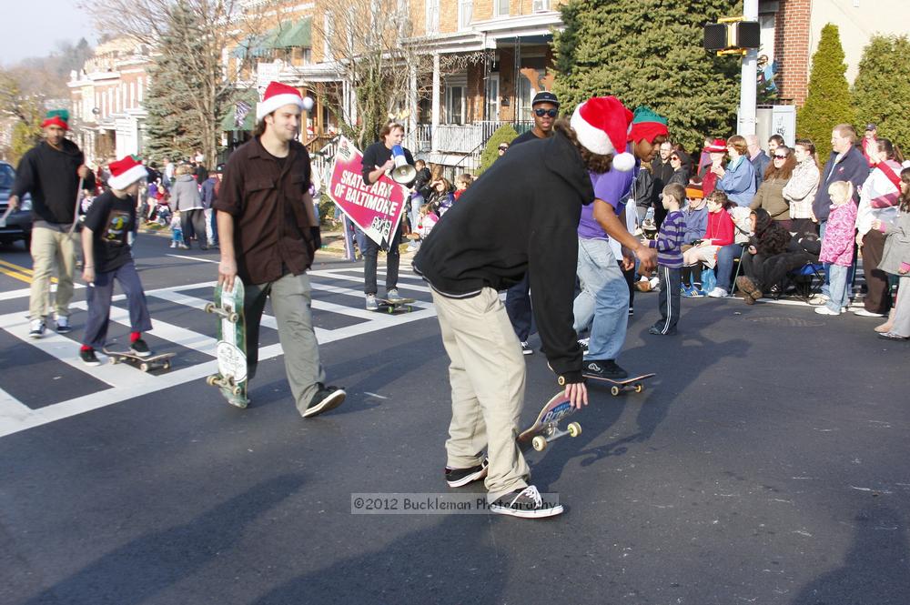 40th Annual Mayors Christmas Parade 2012\nPhotography by: Buckleman Photography\nall images ©2012 Buckleman Photography\nThe images displayed here are of low resolution;\nReprints available,  please contact us: \ngerard@bucklemanphotography.com\n410.608.7990\nbucklemanphotography.com\nFile Number 5842.jpg