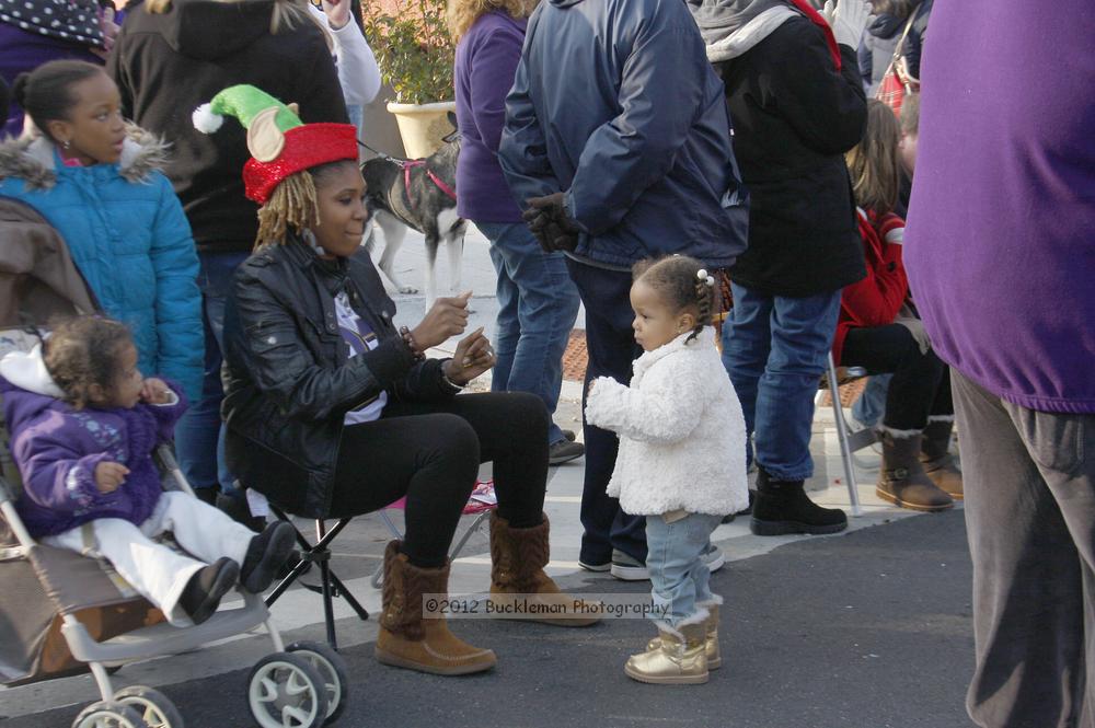 40th Annual Mayors Christmas Parade 2012\nPhotography by: Buckleman Photography\nall images ©2012 Buckleman Photography\nThe images displayed here are of low resolution;\nReprints available,  please contact us: \ngerard@bucklemanphotography.com\n410.608.7990\nbucklemanphotography.com\nFile Number 5847.jpg