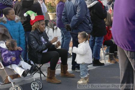 40th Annual Mayors Christmas Parade 2012\nPhotography by: Buckleman Photography\nall images ©2012 Buckleman Photography\nThe images displayed here are of low resolution;\nReprints available,  please contact us: \ngerard@bucklemanphotography.com\n410.608.7990\nbucklemanphotography.com\nFile Number 5847.jpg