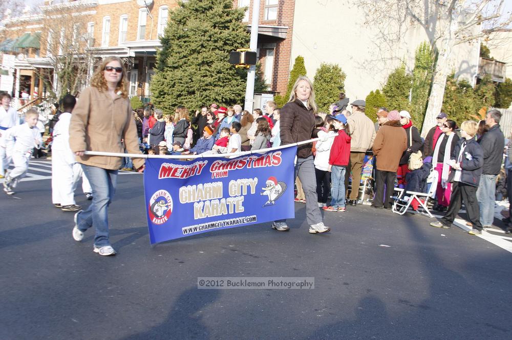 40th Annual Mayors Christmas Parade 2012\nPhotography by: Buckleman Photography\nall images ©2012 Buckleman Photography\nThe images displayed here are of low resolution;\nReprints available,  please contact us: \ngerard@bucklemanphotography.com\n410.608.7990\nbucklemanphotography.com\nFile Number 5855.jpg