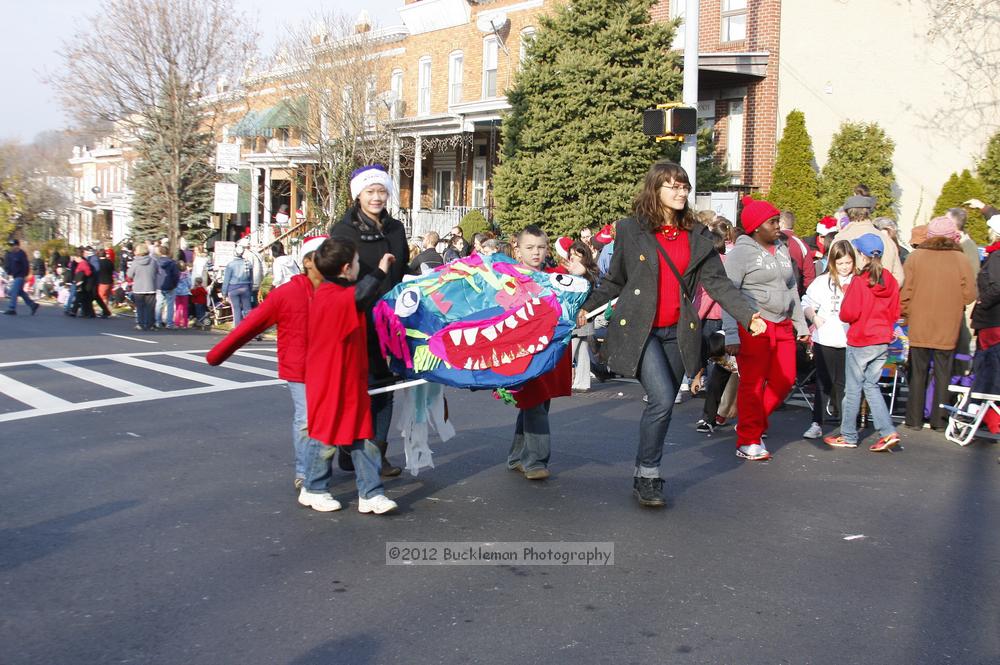 40th Annual Mayors Christmas Parade 2012\nPhotography by: Buckleman Photography\nall images ©2012 Buckleman Photography\nThe images displayed here are of low resolution;\nReprints available,  please contact us: \ngerard@bucklemanphotography.com\n410.608.7990\nbucklemanphotography.com\nFile Number 5868.jpg