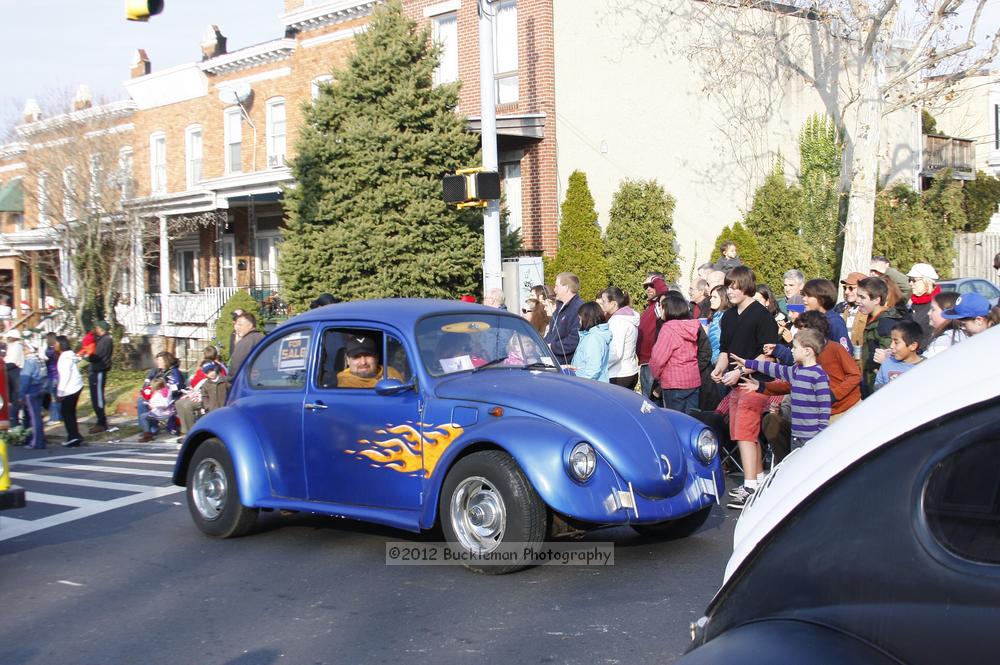 40th Annual Mayors Christmas Parade 2012\nPhotography by: Buckleman Photography\nall images ©2012 Buckleman Photography\nThe images displayed here are of low resolution;\nReprints available,  please contact us: \ngerard@bucklemanphotography.com\n410.608.7990\nbucklemanphotography.com\nFile Number 5923.jpg