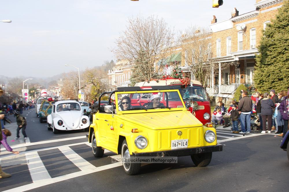 40th Annual Mayors Christmas Parade 2012\nPhotography by: Buckleman Photography\nall images ©2012 Buckleman Photography\nThe images displayed here are of low resolution;\nReprints available,  please contact us: \ngerard@bucklemanphotography.com\n410.608.7990\nbucklemanphotography.com\nFile Number 5924.jpg