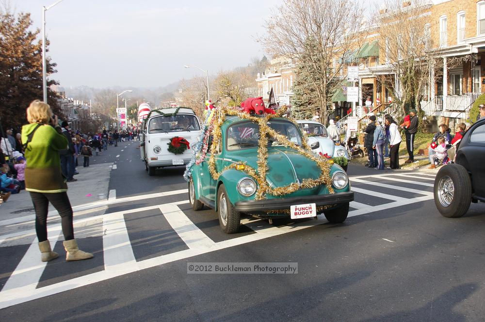 40th Annual Mayors Christmas Parade 2012\nPhotography by: Buckleman Photography\nall images ©2012 Buckleman Photography\nThe images displayed here are of low resolution;\nReprints available,  please contact us: \ngerard@bucklemanphotography.com\n410.608.7990\nbucklemanphotography.com\nFile Number 5928.jpg