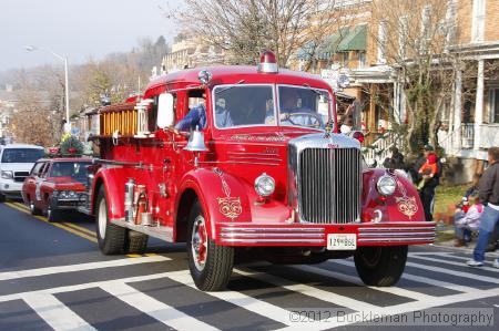 40th Annual Mayors Christmas Parade 2012\nPhotography by: Buckleman Photography\nall images ©2012 Buckleman Photography\nThe images displayed here are of low resolution;\nReprints available,  please contact us: \ngerard@bucklemanphotography.com\n410.608.7990\nbucklemanphotography.com\nFile Number 5946.jpg