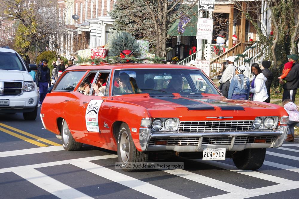 40th Annual Mayors Christmas Parade 2012\nPhotography by: Buckleman Photography\nall images ©2012 Buckleman Photography\nThe images displayed here are of low resolution;\nReprints available,  please contact us: \ngerard@bucklemanphotography.com\n410.608.7990\nbucklemanphotography.com\nFile Number 5947.jpg