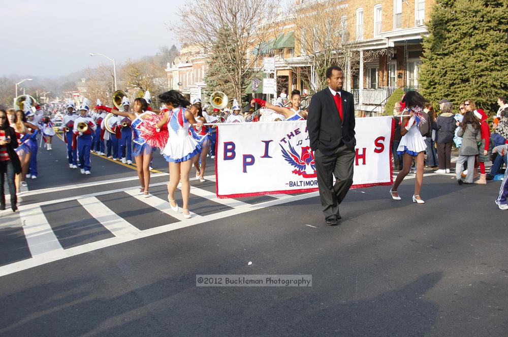 40th Annual Mayors Christmas Parade 2012\nPhotography by: Buckleman Photography\nall images ©2012 Buckleman Photography\nThe images displayed here are of low resolution;\nReprints available,  please contact us: \ngerard@bucklemanphotography.com\n410.608.7990\nbucklemanphotography.com\nFile Number 5951.jpg