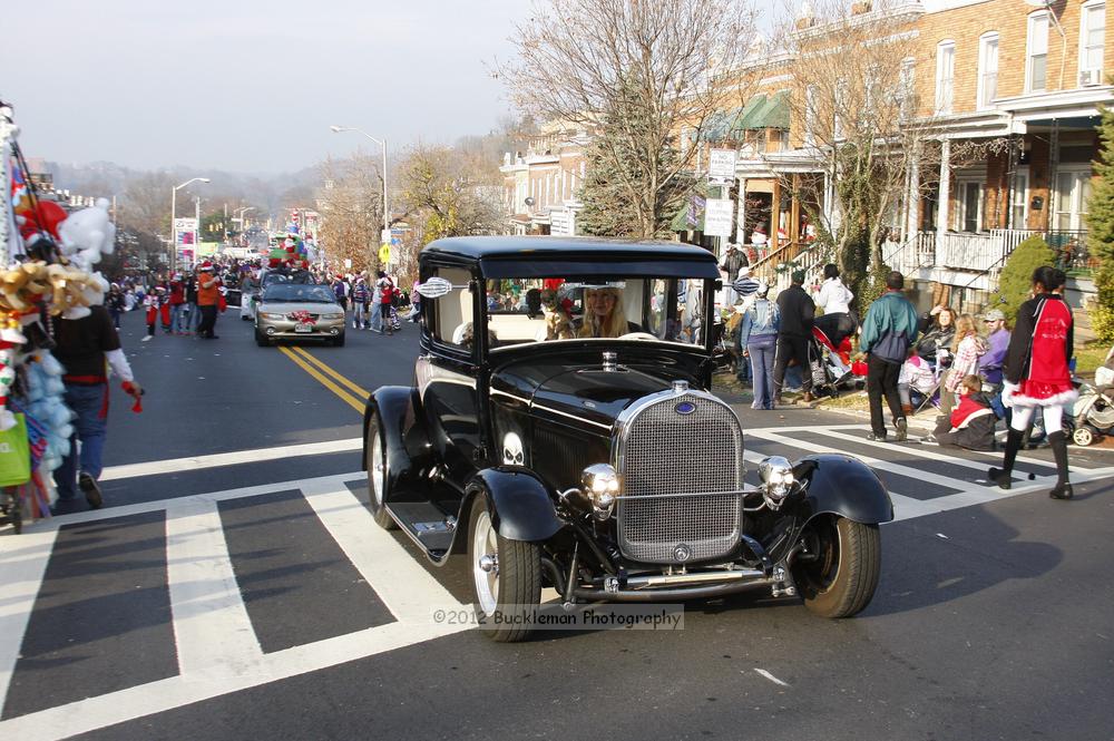 40th Annual Mayors Christmas Parade 2012\nPhotography by: Buckleman Photography\nall images ©2012 Buckleman Photography\nThe images displayed here are of low resolution;\nReprints available,  please contact us: \ngerard@bucklemanphotography.com\n410.608.7990\nbucklemanphotography.com\nFile Number 5992.jpg