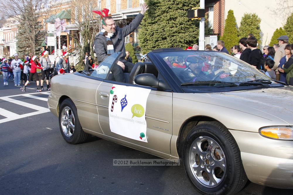 40th Annual Mayors Christmas Parade 2012\nPhotography by: Buckleman Photography\nall images ©2012 Buckleman Photography\nThe images displayed here are of low resolution;\nReprints available,  please contact us: \ngerard@bucklemanphotography.com\n410.608.7990\nbucklemanphotography.com\nFile Number 5998.jpg