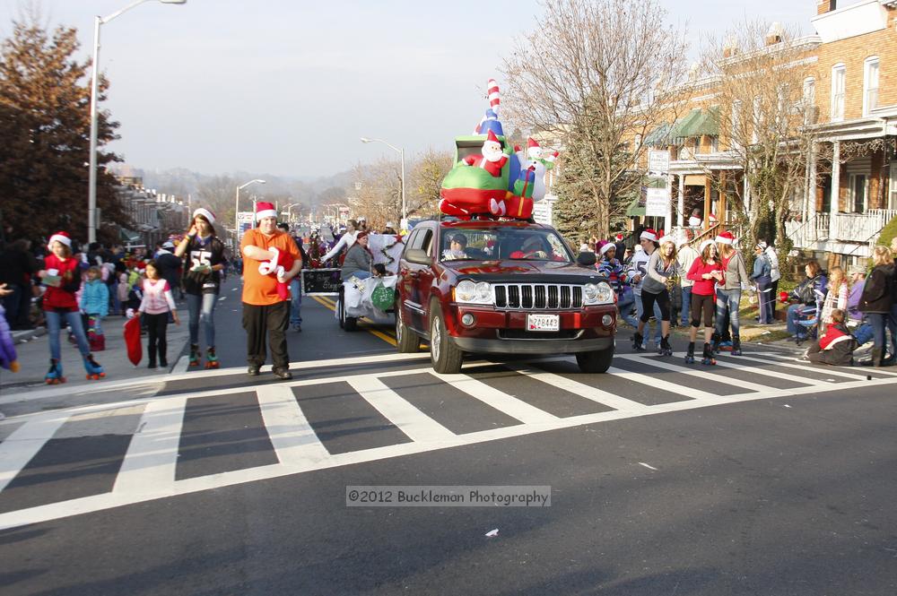 40th Annual Mayors Christmas Parade 2012\nPhotography by: Buckleman Photography\nall images ©2012 Buckleman Photography\nThe images displayed here are of low resolution;\nReprints available,  please contact us: \ngerard@bucklemanphotography.com\n410.608.7990\nbucklemanphotography.com\nFile Number 5999.jpg