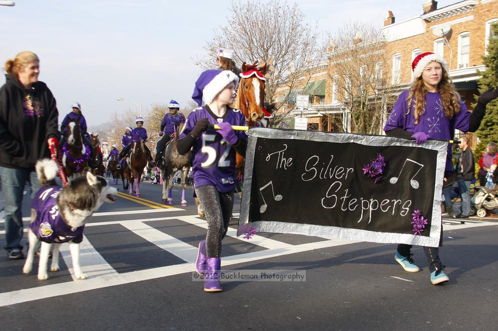 40th Annual Mayors Christmas Parade 2012\nPhotography by: Buckleman Photography\nall images ©2012 Buckleman Photography\nThe images displayed here are of low resolution;\nReprints available,  please contact us: \ngerard@bucklemanphotography.com\n410.608.7990\nbucklemanphotography.com\nFile Number 6002.jpg