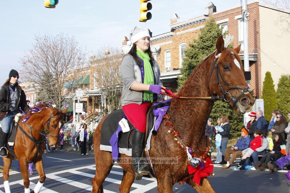 40th Annual Mayors Christmas Parade 2012\nPhotography by: Buckleman Photography\nall images ©2012 Buckleman Photography\nThe images displayed here are of low resolution;\nReprints available,  please contact us: \ngerard@bucklemanphotography.com\n410.608.7990\nbucklemanphotography.com\nFile Number 6006.jpg