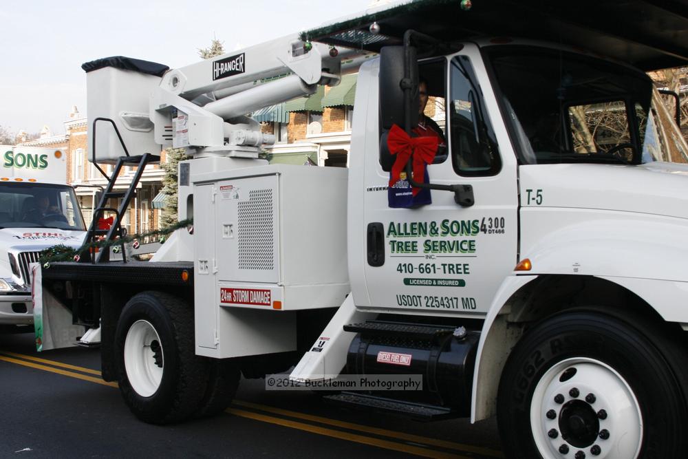 40th Annual Mayors Christmas Parade 2012\nPhotography by: Buckleman Photography\nall images ©2012 Buckleman Photography\nThe images displayed here are of low resolution;\nReprints available,  please contact us: \ngerard@bucklemanphotography.com\n410.608.7990\nbucklemanphotography.com\nFile Number 2661.jpg