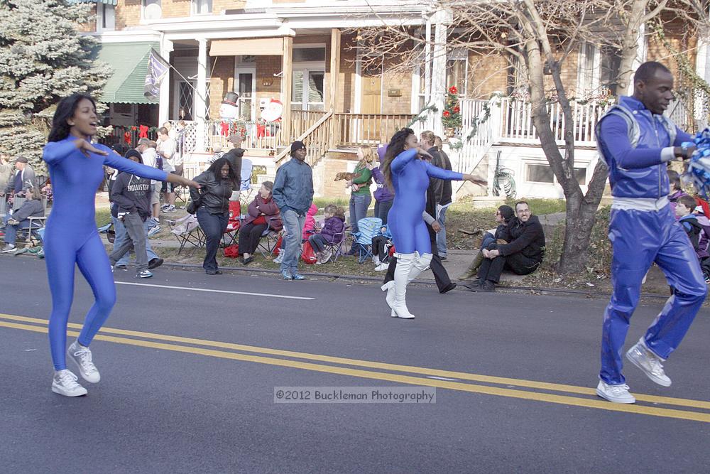 40th Annual Mayors Christmas Parade 2012\nPhotography by: Buckleman Photography\nall images ©2012 Buckleman Photography\nThe images displayed here are of low resolution;\nReprints available,  please contact us: \ngerard@bucklemanphotography.com\n410.608.7990\nbucklemanphotography.com\nFile Number 2704.jpg