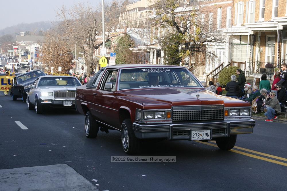 40th Annual Mayors Christmas Parade 2012\nPhotography by: Buckleman Photography\nall images ©2012 Buckleman Photography\nThe images displayed here are of low resolution;\nReprints available,  please contact us: \ngerard@bucklemanphotography.com\n410.608.7990\nbucklemanphotography.com\nFile Number 2717.jpg