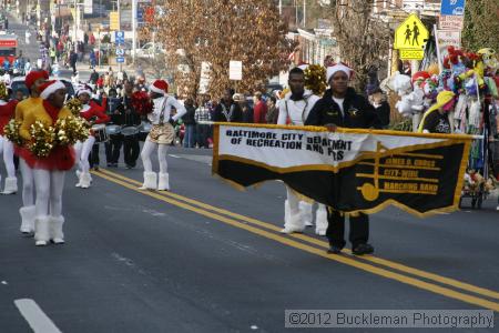 40th Annual Mayors Christmas Parade 2012\nPhotography by: Buckleman Photography\nall images ©2012 Buckleman Photography\nThe images displayed here are of low resolution;\nReprints available,  please contact us: \ngerard@bucklemanphotography.com\n410.608.7990\nbucklemanphotography.com\nFile Number 2734.jpg