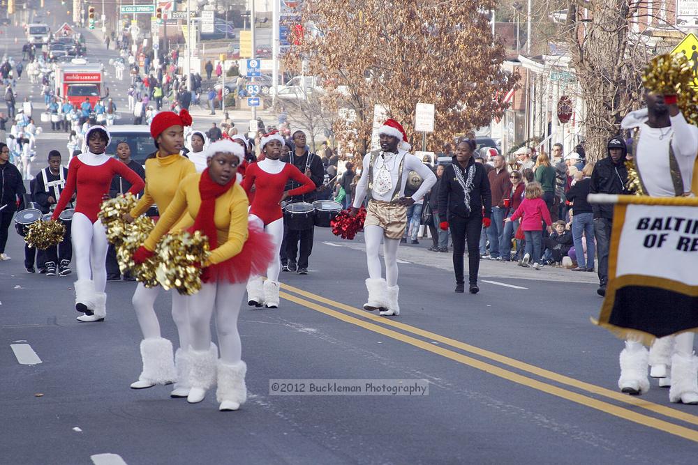 40th Annual Mayors Christmas Parade 2012\nPhotography by: Buckleman Photography\nall images ©2012 Buckleman Photography\nThe images displayed here are of low resolution;\nReprints available,  please contact us: \ngerard@bucklemanphotography.com\n410.608.7990\nbucklemanphotography.com\nFile Number 2735.jpg