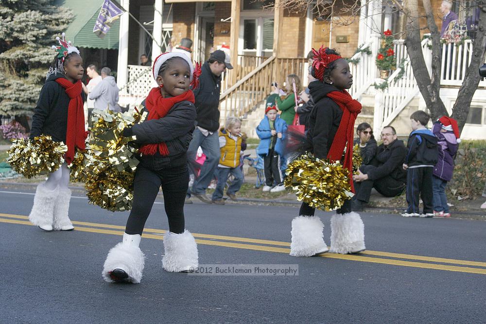 40th Annual Mayors Christmas Parade 2012\nPhotography by: Buckleman Photography\nall images ©2012 Buckleman Photography\nThe images displayed here are of low resolution;\nReprints available,  please contact us: \ngerard@bucklemanphotography.com\n410.608.7990\nbucklemanphotography.com\nFile Number 2745.jpg