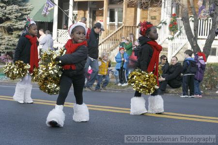 40th Annual Mayors Christmas Parade 2012\nPhotography by: Buckleman Photography\nall images ©2012 Buckleman Photography\nThe images displayed here are of low resolution;\nReprints available,  please contact us: \ngerard@bucklemanphotography.com\n410.608.7990\nbucklemanphotography.com\nFile Number 2745.jpg