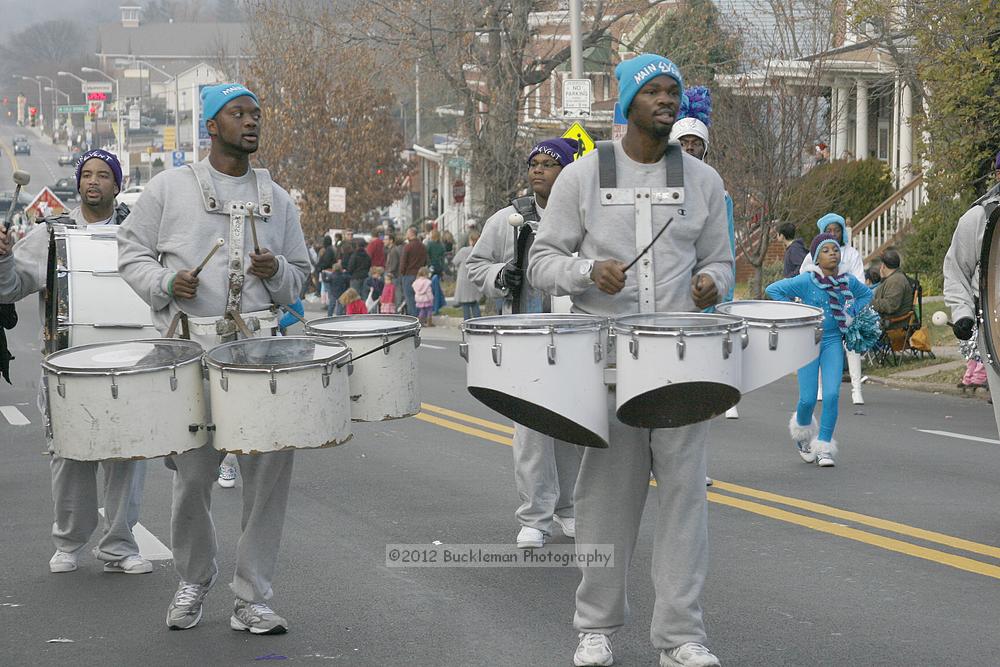 40th Annual Mayors Christmas Parade 2012\nPhotography by: Buckleman Photography\nall images ©2012 Buckleman Photography\nThe images displayed here are of low resolution;\nReprints available,  please contact us: \ngerard@bucklemanphotography.com\n410.608.7990\nbucklemanphotography.com\nFile Number 2802.jpg