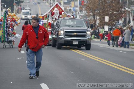 40th Annual Mayors Christmas Parade 2012\nPhotography by: Buckleman Photography\nall images ©2012 Buckleman Photography\nThe images displayed here are of low resolution;\nReprints available,  please contact us: \ngerard@bucklemanphotography.com\n410.608.7990\nbucklemanphotography.com\nFile Number 2819.jpg