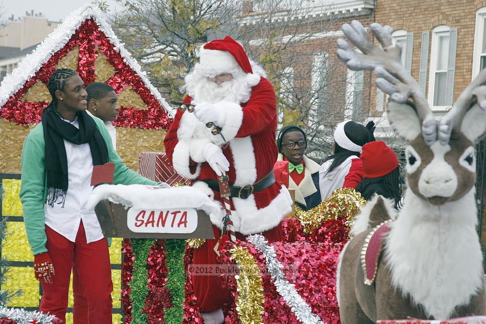 40th Annual Mayors Christmas Parade 2012\nPhotography by: Buckleman Photography\nall images ©2012 Buckleman Photography\nThe images displayed here are of low resolution;\nReprints available,  please contact us: \ngerard@bucklemanphotography.com\n410.608.7990\nbucklemanphotography.com\nFile Number 2827.jpg