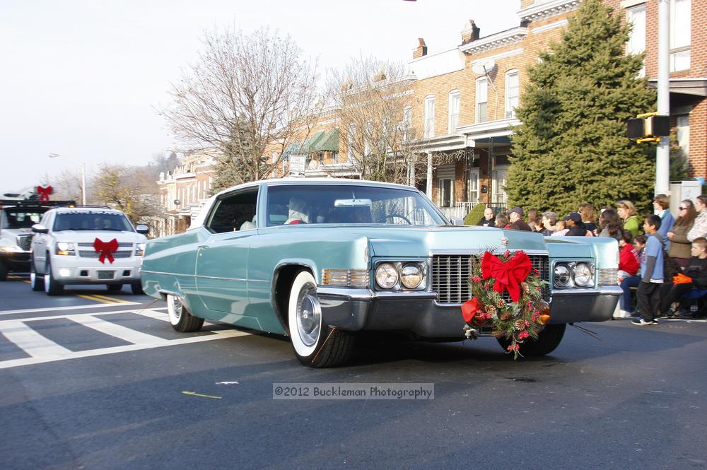 40th Annual Mayors Christmas Parade 2012\nPhotography by: Buckleman Photography\nall images ©2012 Buckleman Photography\nThe images displayed here are of low resolution;\nReprints available,  please contact us: \ngerard@bucklemanphotography.com\n410.608.7990\nbucklemanphotography.com\nFile Number 6039.jpg