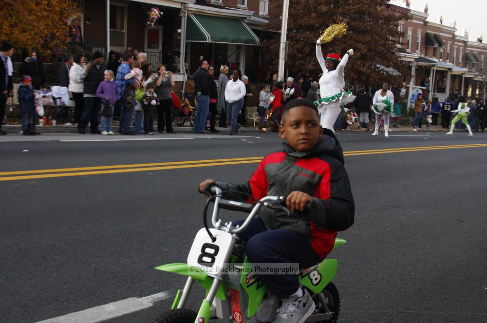 40th Annual Mayors Christmas Parade 2012\nPhotography by: Buckleman Photography\nall images ©2012 Buckleman Photography\nThe images displayed here are of low resolution;\nReprints available,  please contact us: \ngerard@bucklemanphotography.com\n410.608.7990\nbucklemanphotography.com\nFile Number 6059.jpg