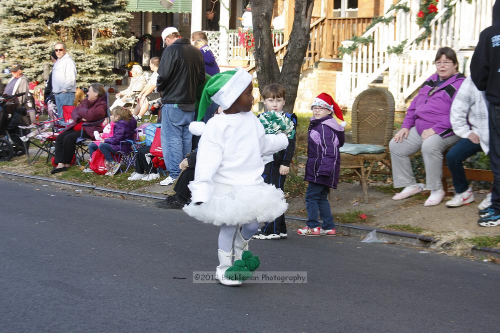 40th Annual Mayors Christmas Parade 2012\nPhotography by: Buckleman Photography\nall images ©2012 Buckleman Photography\nThe images displayed here are of low resolution;\nReprints available,  please contact us: \ngerard@bucklemanphotography.com\n410.608.7990\nbucklemanphotography.com\nFile Number 6065.jpg