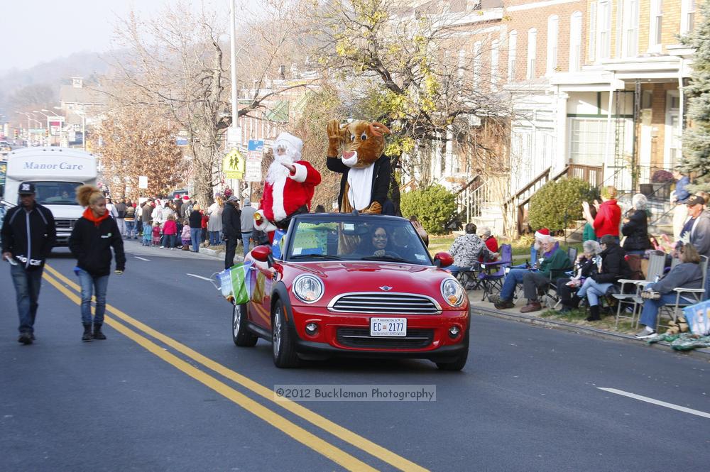 40th Annual Mayors Christmas Parade 2012\nPhotography by: Buckleman Photography\nall images ©2012 Buckleman Photography\nThe images displayed here are of low resolution;\nReprints available,  please contact us: \ngerard@bucklemanphotography.com\n410.608.7990\nbucklemanphotography.com\nFile Number 6069.jpg