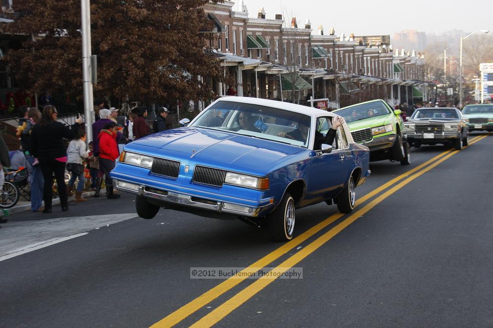 40th Annual Mayors Christmas Parade 2012\nPhotography by: Buckleman Photography\nall images ©2012 Buckleman Photography\nThe images displayed here are of low resolution;\nReprints available,  please contact us: \ngerard@bucklemanphotography.com\n410.608.7990\nbucklemanphotography.com\nFile Number 6089.jpg