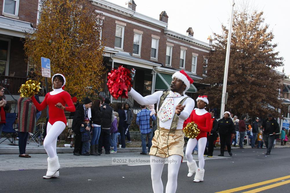 40th Annual Mayors Christmas Parade 2012\nPhotography by: Buckleman Photography\nall images ©2012 Buckleman Photography\nThe images displayed here are of low resolution;\nReprints available,  please contact us: \ngerard@bucklemanphotography.com\n410.608.7990\nbucklemanphotography.com\nFile Number 6120.jpg