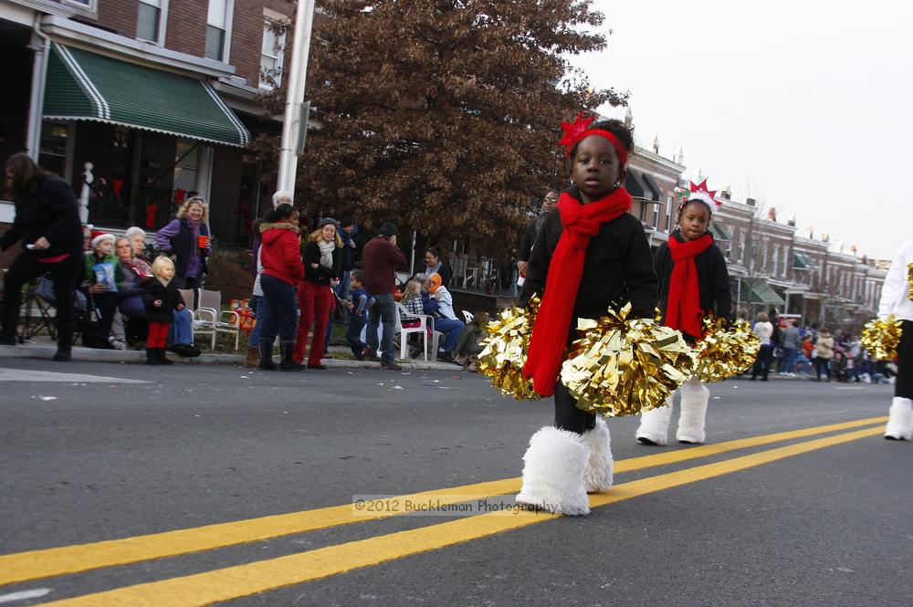 40th Annual Mayors Christmas Parade 2012\nPhotography by: Buckleman Photography\nall images ©2012 Buckleman Photography\nThe images displayed here are of low resolution;\nReprints available,  please contact us: \ngerard@bucklemanphotography.com\n410.608.7990\nbucklemanphotography.com\nFile Number 6128.jpg