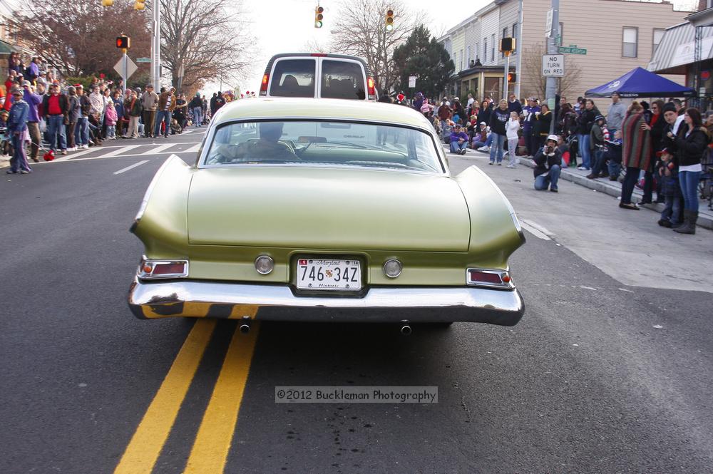 40th Annual Mayors Christmas Parade 2012\nPhotography by: Buckleman Photography\nall images ©2012 Buckleman Photography\nThe images displayed here are of low resolution;\nReprints available,  please contact us: \ngerard@bucklemanphotography.com\n410.608.7990\nbucklemanphotography.com\nFile Number 6143.jpg