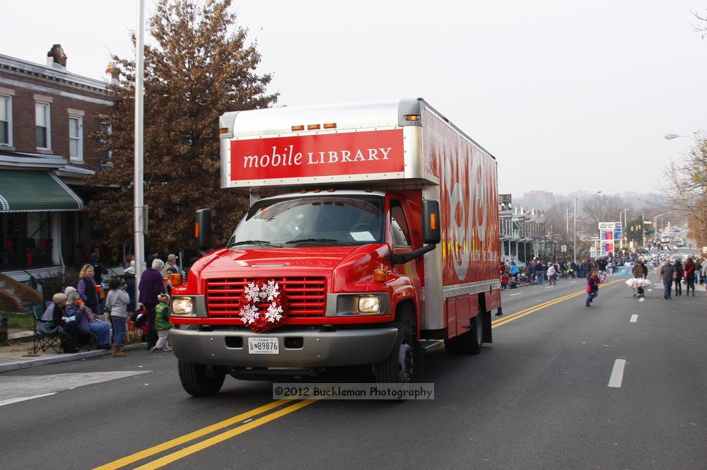 40th Annual Mayors Christmas Parade 2012\nPhotography by: Buckleman Photography\nall images ©2012 Buckleman Photography\nThe images displayed here are of low resolution;\nReprints available,  please contact us: \ngerard@bucklemanphotography.com\n410.608.7990\nbucklemanphotography.com\nFile Number 6163.jpg