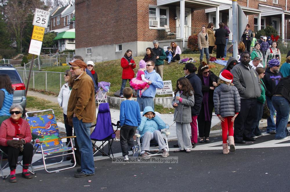 40th Annual Mayors Christmas Parade 2012\nPhotography by: Buckleman Photography\nall images ©2012 Buckleman Photography\nThe images displayed here are of low resolution;\nReprints available,  please contact us: \ngerard@bucklemanphotography.com\n410.608.7990\nbucklemanphotography.com\nFile Number 6167.jpg