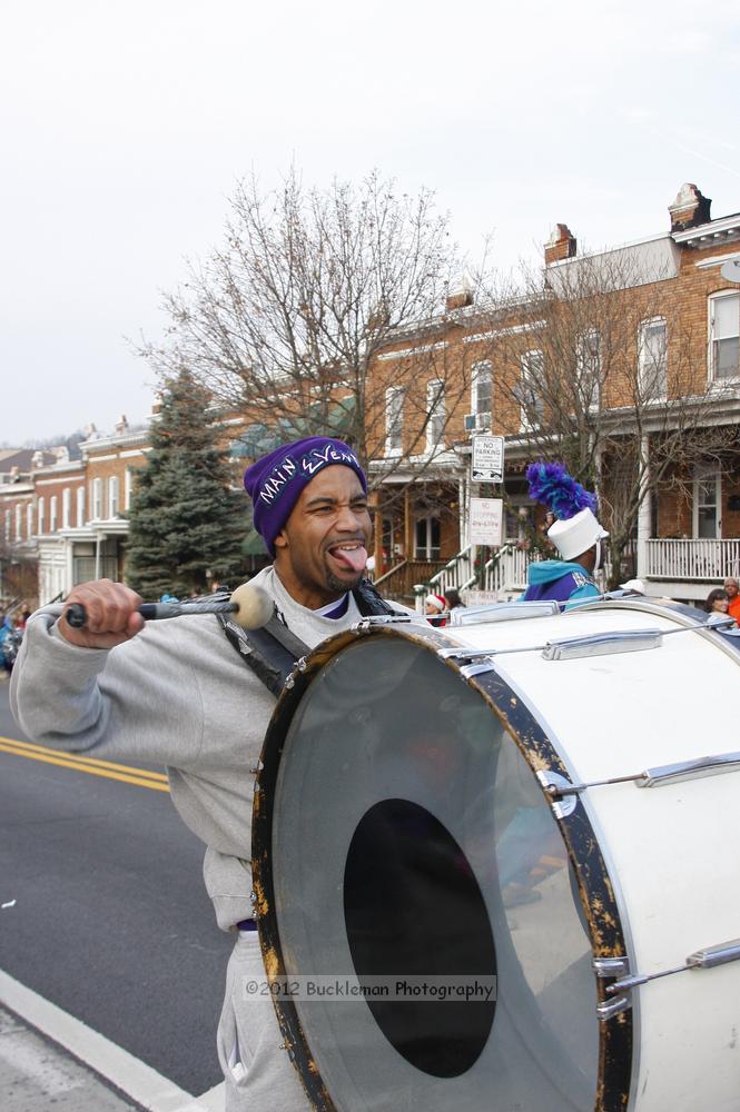 40th Annual Mayors Christmas Parade 2012\nPhotography by: Buckleman Photography\nall images ©2012 Buckleman Photography\nThe images displayed here are of low resolution;\nReprints available,  please contact us: \ngerard@bucklemanphotography.com\n410.608.7990\nbucklemanphotography.com\nFile Number 6201.jpg