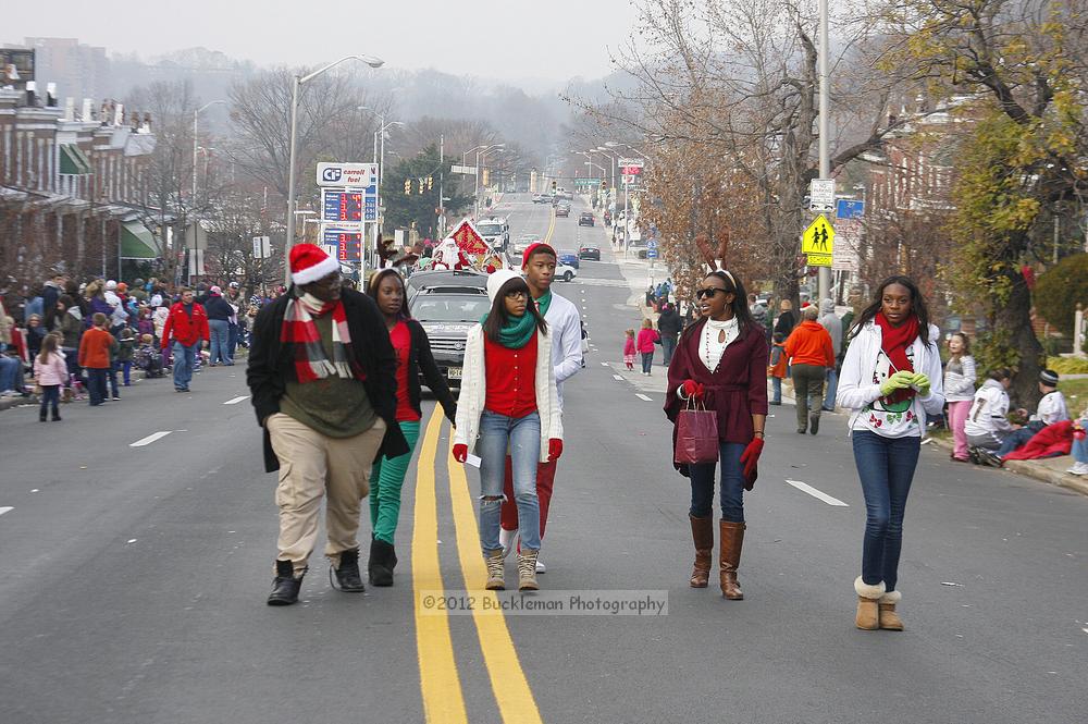 40th Annual Mayors Christmas Parade 2012\nPhotography by: Buckleman Photography\nall images ©2012 Buckleman Photography\nThe images displayed here are of low resolution;\nReprints available,  please contact us: \ngerard@bucklemanphotography.com\n410.608.7990\nbucklemanphotography.com\nFile Number 6208.jpg