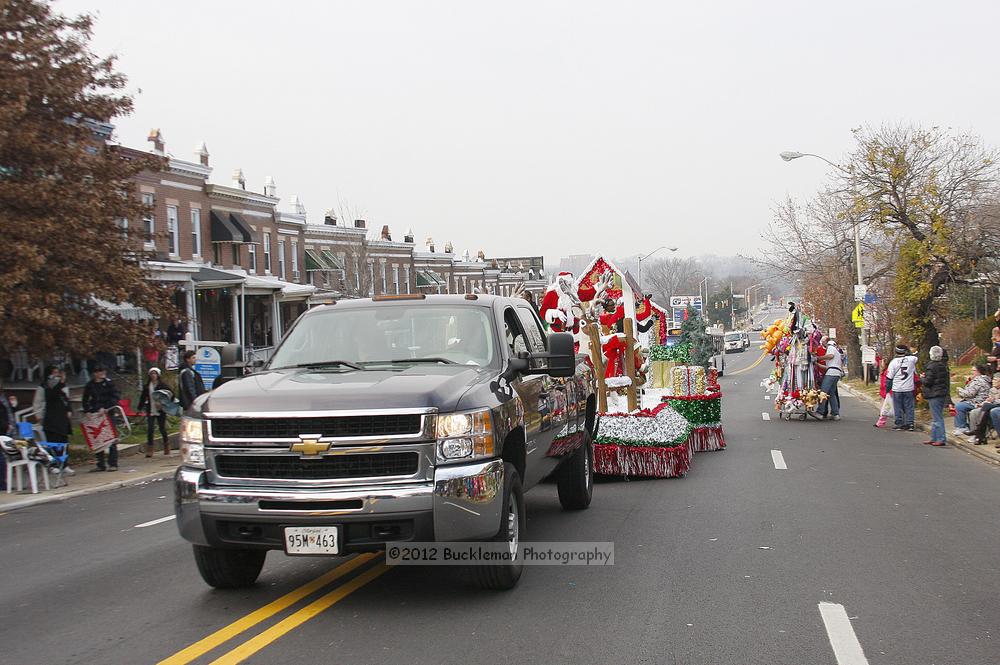 40th Annual Mayors Christmas Parade 2012\nPhotography by: Buckleman Photography\nall images ©2012 Buckleman Photography\nThe images displayed here are of low resolution;\nReprints available,  please contact us: \ngerard@bucklemanphotography.com\n410.608.7990\nbucklemanphotography.com\nFile Number 6216.jpg