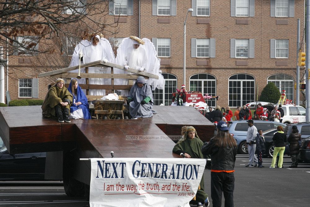 40th Annual Mayors Christmas Parade 2012\nPhotography by: Buckleman Photography\nall images ©2012 Buckleman Photography\nThe images displayed here are of low resolution;\nReprints available,  please contact us: \ngerard@bucklemanphotography.com\n410.608.7990\nbucklemanphotography.com\nFile Number 2006.jpg