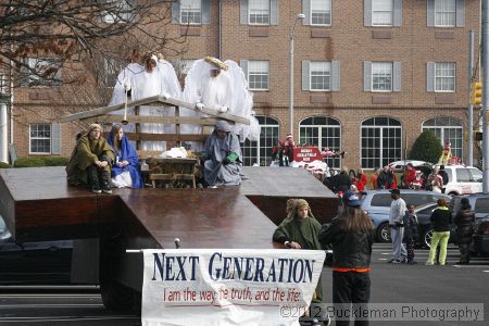 40th Annual Mayors Christmas Parade 2012\nPhotography by: Buckleman Photography\nall images ©2012 Buckleman Photography\nThe images displayed here are of low resolution;\nReprints available,  please contact us: \ngerard@bucklemanphotography.com\n410.608.7990\nbucklemanphotography.com\nFile Number 2006.jpg