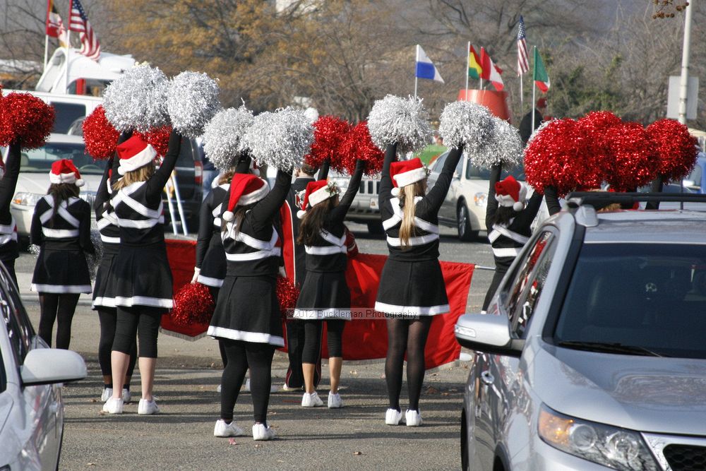 40th Annual Mayors Christmas Parade 2012\nPhotography by: Buckleman Photography\nall images ©2012 Buckleman Photography\nThe images displayed here are of low resolution;\nReprints available,  please contact us: \ngerard@bucklemanphotography.com\n410.608.7990\nbucklemanphotography.com\nFile Number 2042.jpg