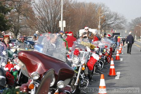 40th Annual Mayors Christmas Parade 2012\nPhotography by: Buckleman Photography\nall images ©2012 Buckleman Photography\nThe images displayed here are of low resolution;\nReprints available,  please contact us: \ngerard@bucklemanphotography.com\n410.608.7990\nbucklemanphotography.com\nFile Number 2052.jpg