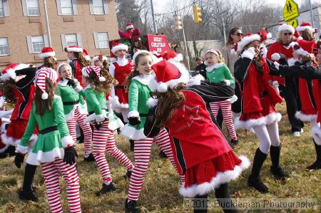 40th Annual Mayors Christmas Parade 2012\nPhotography by: Buckleman Photography\nall images ©2012 Buckleman Photography\nThe images displayed here are of low resolution;\nReprints available,  please contact us: \ngerard@bucklemanphotography.com\n410.608.7990\nbucklemanphotography.com\nFile Number 5298.jpg