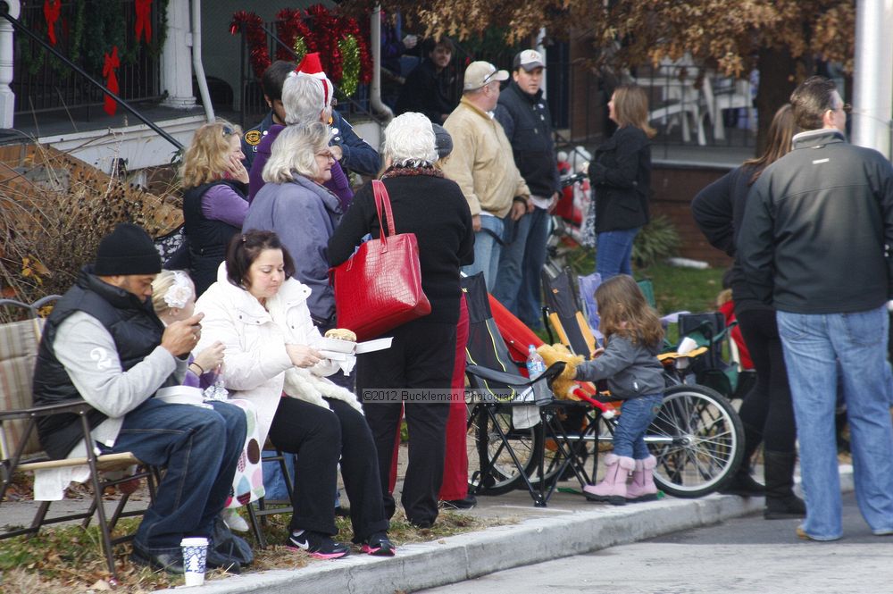 40th Annual Mayors Christmas Parade 2012\nPhotography by: Buckleman Photography\nall images ©2012 Buckleman Photography\nThe images displayed here are of low resolution;\nReprints available,  please contact us: \ngerard@bucklemanphotography.com\n410.608.7990\nbucklemanphotography.com\nFile Number 5347.jpg